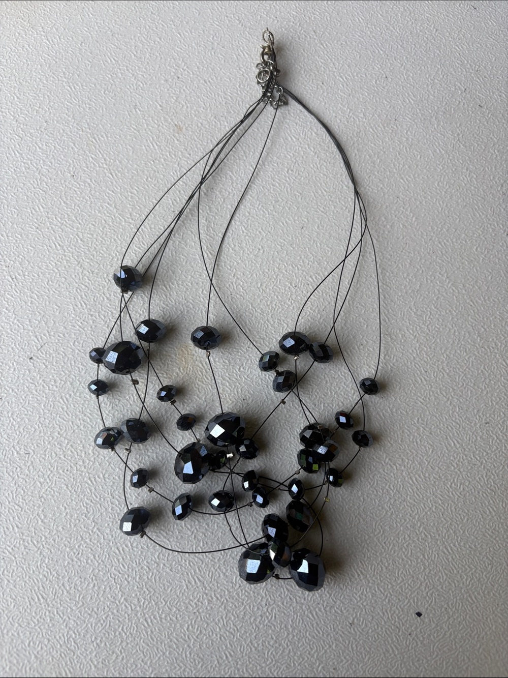 Multi-Strand Black Faceted Bead Necklace